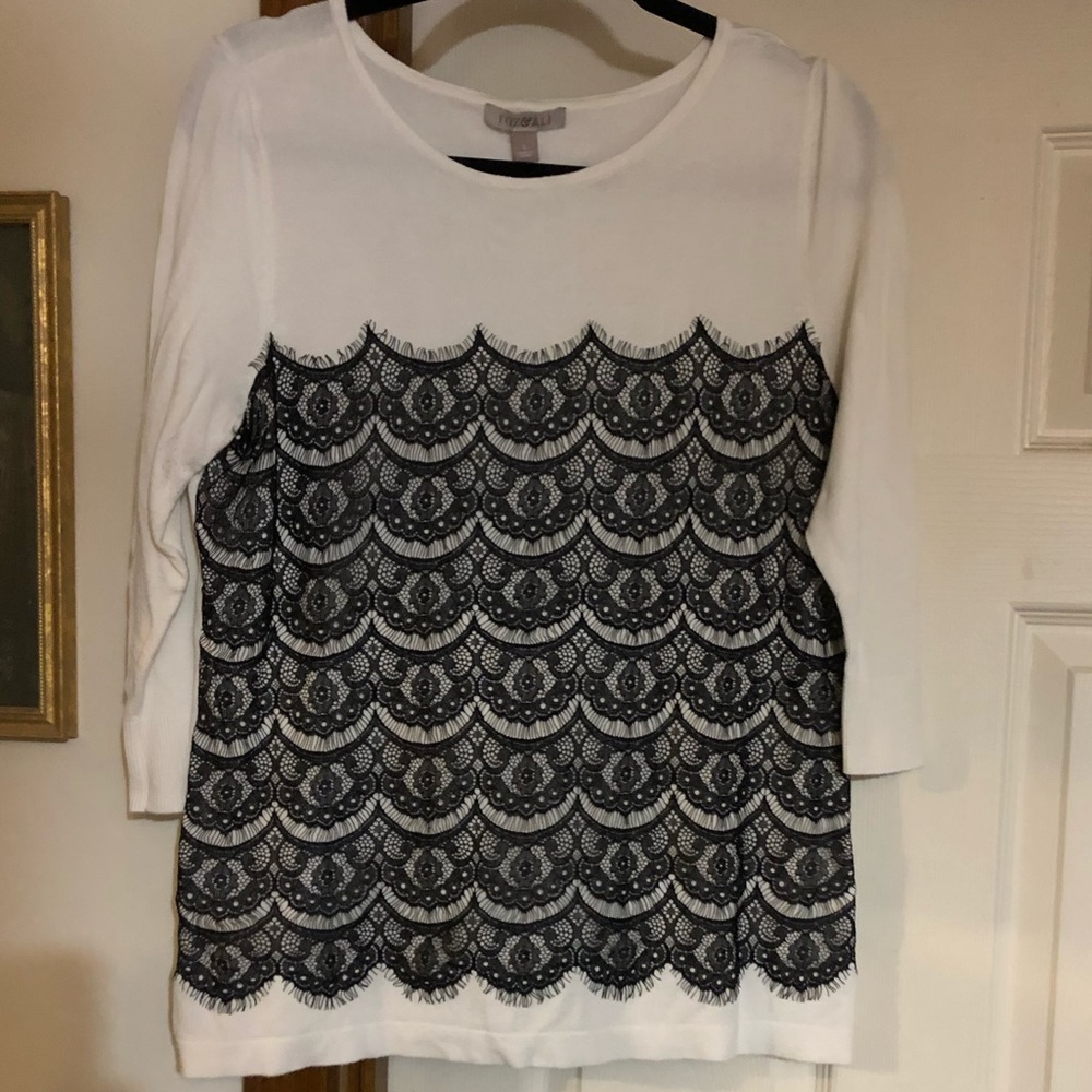 White and black sweater